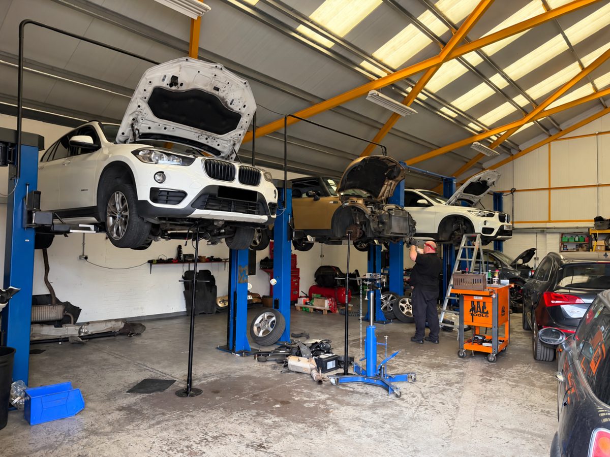 Beds Automatic Transmissions workshop in Barton-le-Clay with vehicles on lifts